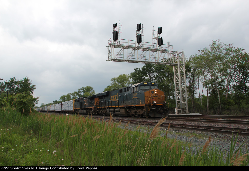 CSX 982 and 75 pass under a cantilever signal bridge
